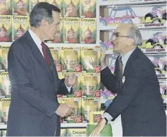  ??  ?? Lazarus with George HW Bush in Japan in 1992