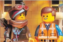  ?? WARNER BROS. PICTURES WARNER BROS. PICTURES ?? Lucy (voice of Elizabeth Banks) and Emmet (Chris Pratt) face alien invaders in “The Lego Movie 2: The Second Part.”