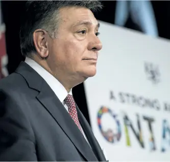  ?? THE CANADIAN PRESS FILES ?? Ontario Finance Minister Charles Sousa says the cost of auto insurance fraud is estimated to be as high as $1.6 billion a year. Ontarians pay the highest price for auto insurance in Canada, despite having a low level of accidents.