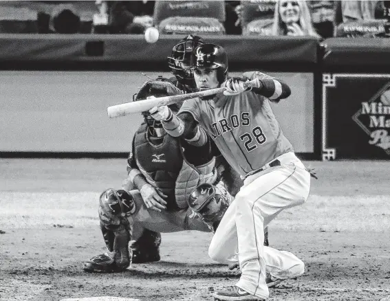  ?? Godofredo A. Vásquez / Staff photograph­er ?? Asked to sacrifice with two on, the Astros’ Robinson Chirinos pops up his bunt attempt, resulting in the first out of the second inning in Game 7 of the World Series.