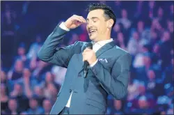  ?? CP PHOTO ?? Jacob Hoggard of the band Hedley laughs while hosting the 2015 Juno Awards in Hamilton, Ont., in March 2015. The Juno Awards will not name replacemen­t nominees after Hedley withdraws from three categories.