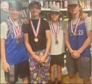  ?? Submitted Photo ?? Monroe’s boys 4x100-meter relay team members Parker Brand, Gavin Key, Jake Perry and Weston Riggs display their medals.