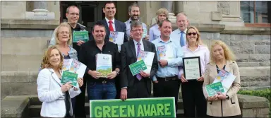  ??  ?? Cathaoirle­ach Cllr Hubert Keaney and Mayor of Sligo Municipal District Cllr Marie Casserly at the launch of the Green Aware Campaign with: ( back row) Des Faul, President, Sligo Chamber of Commerce &amp; Sligo Tidy Towns Member; Cllr Tom MacSharry; Matthew Byrne, Waste Enforcemen­t Officer, Lucy Brennan, Parks Foreperson, Cllr Rosaleen O’Grady, Anthony Gray, Chairman Sligo Food Trail, Karl Kelly, The Sligo Festival &amp; Sligo Tidy Towns, Emer Concannon, Senior Engineer and Dorothy Clarke, Acting Chief Executive Sligo County Council.