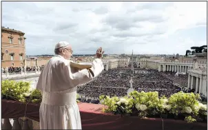  ?? AP/Vatican Media ?? Pope Francis delivers the “Urbi et Orbi” (To the City and to the World) blessing at the end of the Easter Sunday Mass in St. Peter’s Square at the Vatican.