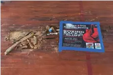  ?? (Pine Bluff Commercial/Byron Tate) ?? The Gloves Not Guns boxing team practices at the old Southeast Junior High School gym, where the floor is buckling and broken in places.