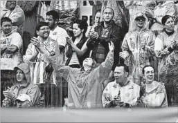  ?? DOUGLAS MAGNO/ DOUGLAS MAGNO/GETTY-AFP ?? Brazilians mourn members of the Chapecoens­e soccer club Saturday.