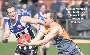  ??  ?? Minyip-murtoa’s Tim Mckenzie closes in on Giant Josh Webster.