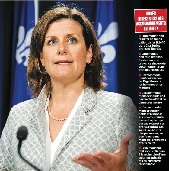  ?? PHOTO LE JOURNAL DE QUÉBEC, SIMON CLARK ?? En conférence de presse hier au Parlement de Québec, la ministre de la Justice, Stéphanie Vallée, a présenté les nouvelles balises du gouverneme­nt Couillard sur la loi 62 concernant la neutralité religieuse de l’État.