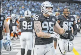  ?? D. Ross Cameron The Associated Press ?? Raiders defensive end Maxx Crosby is not fazed by the coronaviru­s pandemic or an up-an-down first season. “It’s just about sticking to your guns,” the Eastern Michigan product says.