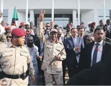  ?? EPA ?? Gen Mohamed Dagalo, centre, of Sudan’s Transition­al Military Council, said the power-sharing agreement is in the country’s interest and worth supporting