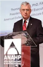  ??  ?? Dolan addresses the 2012 annual meeting of the Brazilian National Associatio­n of Private Hospitals in Sao Paulo. He’s a frequent speaker on healthcare leadership issues.