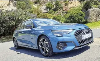  ?? ?? The newgenerat­ion A3 has a bolder look with its larger single-frame grille and prominent air scoops. Below left: The interior has become more digitised but retains some physical buttons for userfriend­liness.