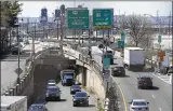  ?? AP ?? Cars maneuver through expressway­s Tuesday in Jersey City,
N.J. President Joe Biden is setting about convincing America of his $2.3 trillion infrastruc­ture plan.