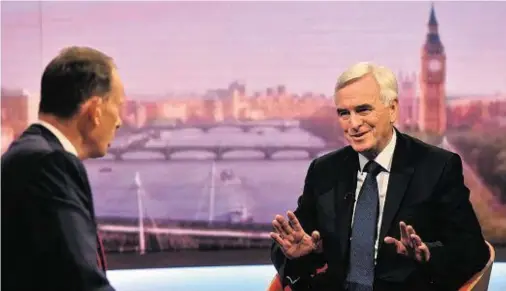  ??  ?? TURMOIL: Shadow Chancellor John McDonnell, right, told Andrew Marr opponents of Jeremy Corbyn were trying to destroy Labour