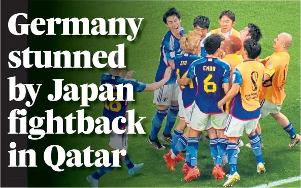  ?? ?? BIG IN JAPAN: Japan’s jubilant players and coaching staff sparked wild celebratio­ns following the defeat of Germany at the World Cup.