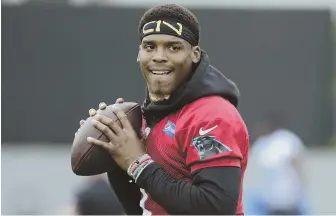  ?? AP PHOTO ?? GETTING BACK INTO FORM: Cam Newton, shown during Panthers organized team activities last week, is making progress from offseason shoulder surgery.