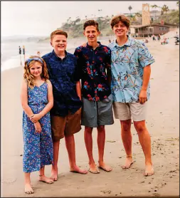  ?? ?? A picture of the Patchett siblings — from left, Bella, Rex, Luke and Travis — is displayed in the family’s home in Henderson. Rex Patchett, 13, was killed by a motorist who lost control of his car March 7.