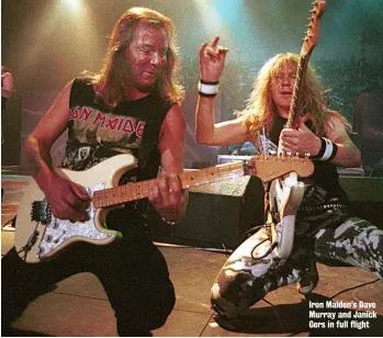  ??  ?? Iron Maiden’s Dave Murray and Janick Gers in full flight