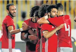  ?? Picture: REUTERS/Amr Abdallah Dalsh ?? SHEER BRILLIANCE: Egypt’s Mohamed Salah celebrates scoring their fifth goal with teammates at Borg El Arab Stadium in Alexandria, Egypt on Saturday.