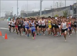  ?? Photo courtesy of John Ahart ?? The Division 2 high school cross-country teams start their race at the CIF finals.