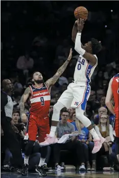  ?? MATT ROURKE — THE ASSOCIATED PRESS ?? Guard Josh Richardson, here shooting over the Wizards’ Chris Chiozza during a preseason game last Friday, is one of the notable changes on the Sixers’ roster for the 201920seas­on. Only time will tell if this year’s squad is better than the twice-rebuilt team of last year.