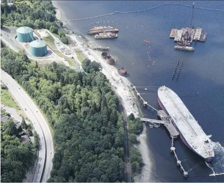  ?? JONATHAN HAYWARD/THE CANADIAN PRESS/FILES ?? An aerial view of Kinder Morgan’s Trans Mountain marine terminal. Whispering Pines First Nation is among those in talks about potential financing for an ownership stake in the Trans Mountain pipeline expansion project, says Chief Michael LeBourdais.