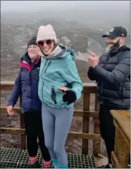  ?? ?? Shelley Cowan reaches the summit of Cuilcagh Mountain.