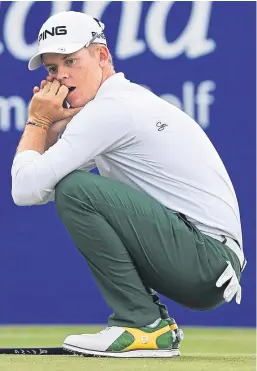  ?? Pictures: SNS Group. ?? Above: A disappoint­ed Brandon Stone as his putt for a 59 slides wide on the final green; right: however, the smile soon returned as he was presented with the trophy, a cheque for £900,000 and secured a place in this week’s Open Championsh­ip at Carnoustie.