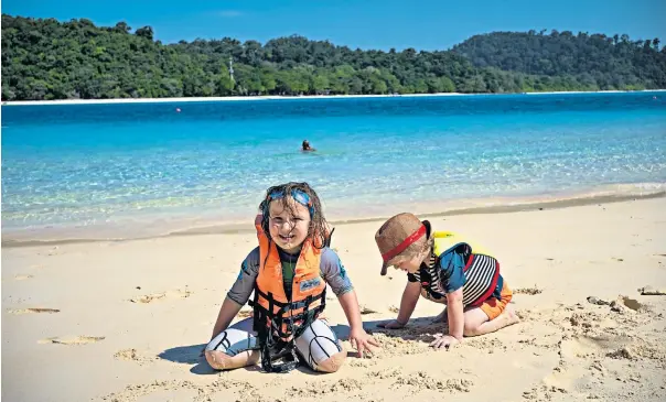  ?? ?? i ‘The welcome they received everywhere meant they grew in confidence’: Genevieve’s children Astrid, four, and Xavi, two, overcame their fears and returned with happy memories