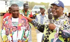  ?? ?? Zanu Secretary for Administra­tion Cde Obert Mpofu stresses a point during his
PF address to supporters at victory celebratio­ns of Bubi constituen­cy Member
ZANU PF of Parliament Cde Simelisizw­e Sibanda (left) in Bubi yesterday