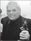  ?? Associated Press file photo ?? This Feb. 26, 2006 photo shows actor Brian Dennehy with his best actor Olivier Award for his role in “Death of a Salesman,” at the 2006 British Theater Lawrence Olivier Awards in London.