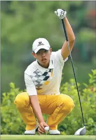  ?? SCOTT HALLERAN / AGENCE FRANCE-PRESSE ?? Fourteen-year-old Guan Tianlang is the youngest player in history to play in a Masters Tournament.