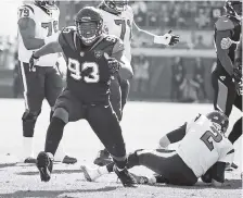  ?? ASSOCIATED PRESS FILE PHOTO ?? Jacksonvil­le Jaguars defensive lineman Calais Campbell celebrates after sacking Houston Texans quarterbac­k T.J. Yates (2) during their Dec. 17 game in Jacksonvil­le, Fla.