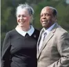  ??  ?? Lee Elder, shown with his wife, Sharon, was the first Black man to play in the Masters in 1975. To honor him, Augusta National will name two scholarshi­ps in his name and he will play an honorary tee shot at the Masters in 2021.