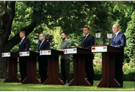  ?? (AP/Natacha Pisarenko) ?? European leaders (from left) Klaus Iohannis of Romania, Mario Draghi of Italy, Volodymyr Zelenskyy of Ukraine, Emmanuel Macron of France and Olaf Scholz of Germany meet Thursday at a conference at the Mariyinsky palace in Kyiv, Ukraine.