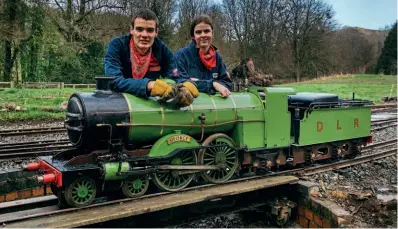  ?? ?? Heritage Railway Associatio­n award-winning Downs Light Railway volunteers Thomas and Lucy Isherwood with 1939-built 4-4-2 George. DLRT