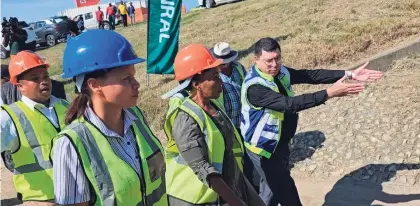  ?? Photos: Alida de Beer ?? Transport Minister Sindisiwe Chikunga was taken on a tour of the bridge. She is flanked by contract manager Petronella Theron and Sanral Western Region manager Randall Cable.