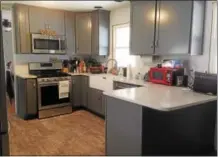  ?? SUBMITTED PHOTO ?? Shown here is a kitchen built and installed in East Coventry by Campbell’s Custom Woodworks of West Pottsgrove. The company, owned by Josh Campbell, has been in business a little more than one year — and specialize­s in custom made cabinets and...
