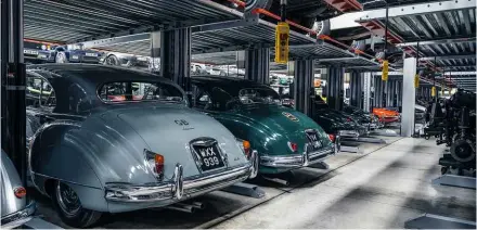  ??  ?? Above and right: 1950s saloons are one small part of the collection. Classic Works is also home to production of continuati­on cars like the D-type, along with a full sales and servicing operation (the XJ220 being a customer car)