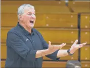  ?? CLOE POISSON | CPOISSON@COURANT.COM ?? FORMER UCONN coach Jim Calhoun hasn’t lost his penchant to yell and chew out players who perform below his expectatio­ns. He made his debut as St. Joseph coach and was smiling at the end as the Blue Jays beat William Paterson 79-74 at Trinity College.