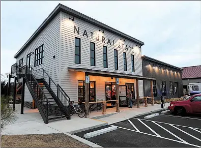  ?? NWA Democrat-Gazette/J.T. WAMPLER ?? Natural State Beer Co. opened Saturday in the Village on the Creeks area in Rogers.