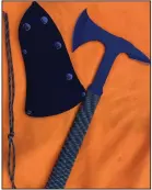  ?? (Arkansas Democrat-Gazette/Bryan Hendricks) ?? The Jason Hanson Ultralight Tactical Tomahawk is excellent for light camp chores and shooting lane maintenanc­e.