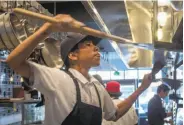  ?? John Storey / Special to The Chronicle 2016 ?? Carlos Hernandez makes bread at Tawla.