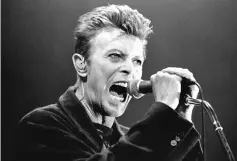  ??  ?? Bowie performs on stage during his concert in Vienna on Feb 4, 1996. —