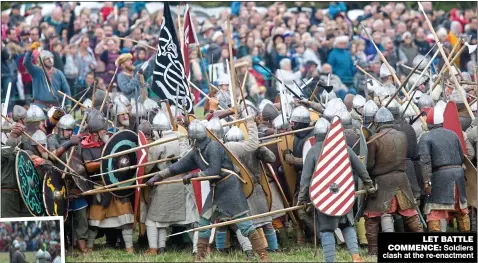  ??  ?? LET BATTLE COMMENCE: Soldiers clash at the re-enactment