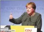  ?? MORRIS MAC MATZEN / REUTERS ?? German Chancellor Angela Merkel speaks during a rally in Hamburg on Wednesday.