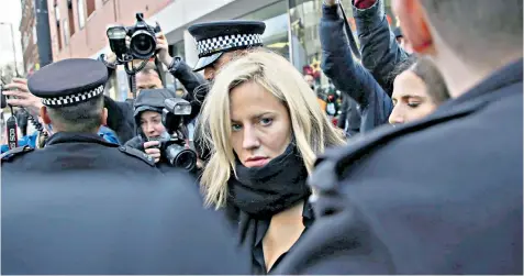  ??  ?? Caroline Flack is mobbed by photograph­ers as she leaves court in London, having been bailed on a charge of assaulting Lewis Burton, below. Ms Flack wept in court as bail conditions stipulated she could not see him until March 4