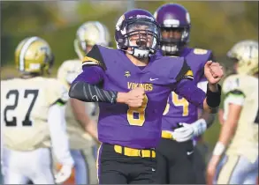  ?? Matthew Brown / Hearst Connecticu­t Media ?? Westhill quarterbac­k AJ Laccona celebrates following a touchdown against Trumbull by teammate Angelo Nicholas during a game on Nov. 4 in Stamford. Laccona is one of three players on the team to win a $5,000 scholarshi­p from Dallas Cowboys head coach Jason Garrett’s Starfish Charities “Make a Difference Challenge” contest.