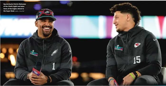  ?? DAVID J. PHILIP/AP ?? Quarterbac­ks Patrick Mahomes of the Chiefs (right) and Jalen Hurts of the Eagles shined in the Super Bowl.