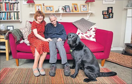  ??  ?? Jeanette and Jon with Lenny, the Dementia Dog that has changed their lives